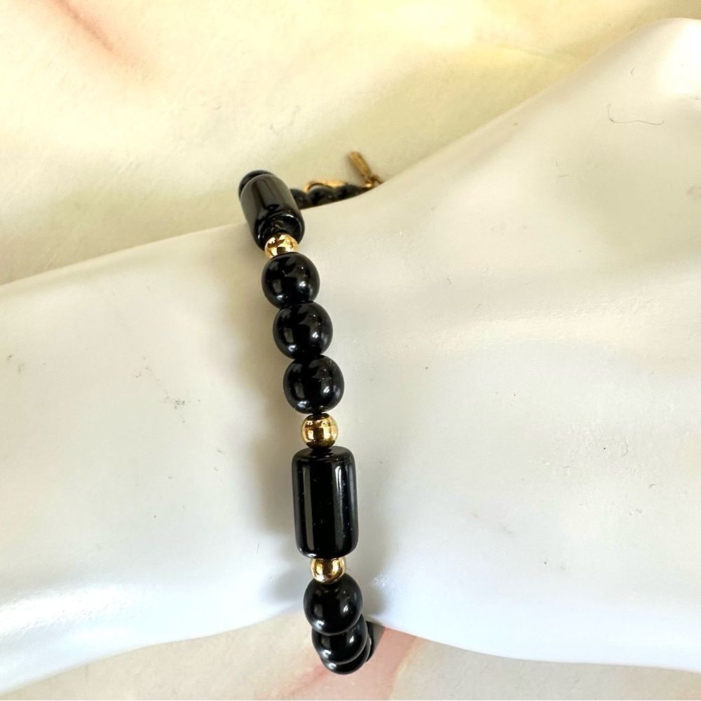 Monet black and gold tone bracelet